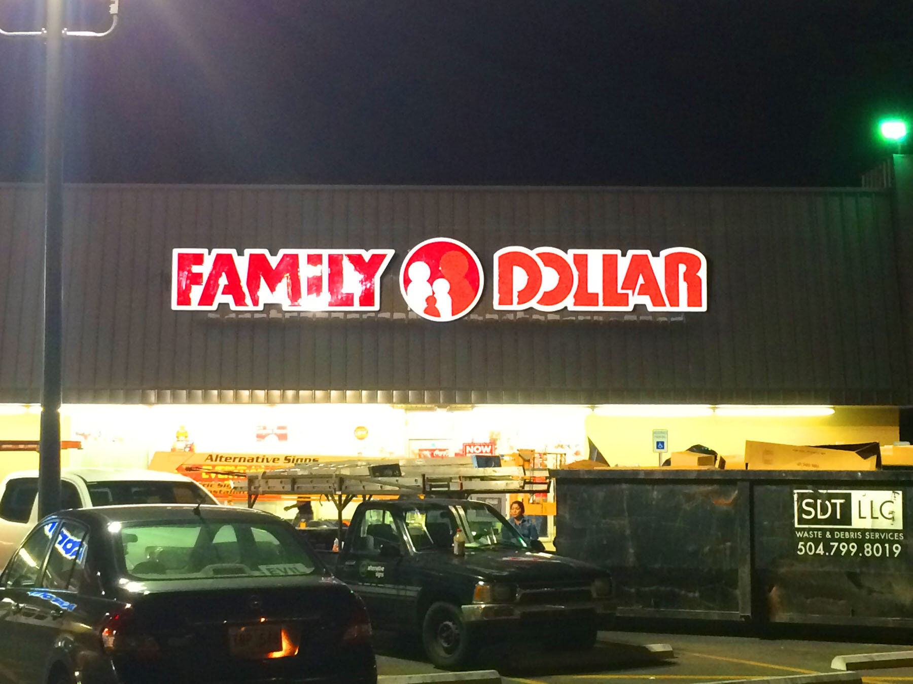 Family Dollar Backlit Sign at Night