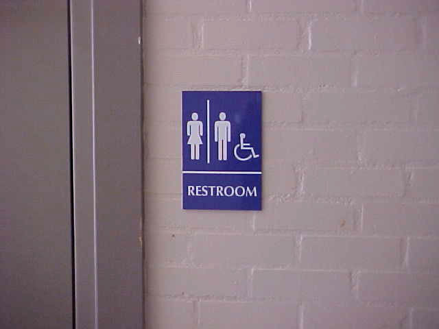 Blue Restroom Interior Sign