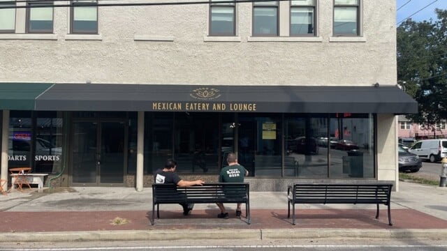 Black Restaurant Awning with gold logo
