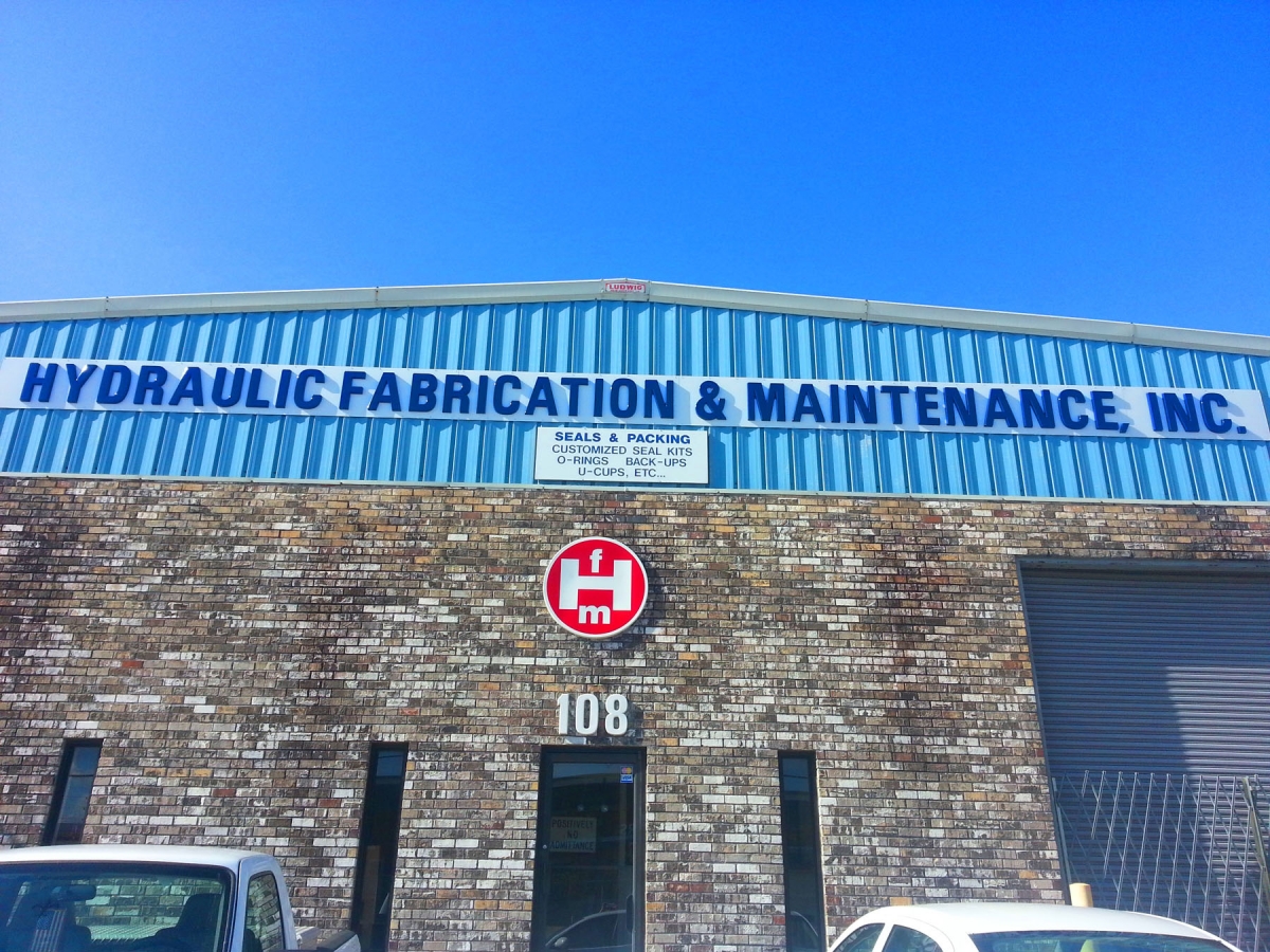 Sign installation in New Orleans Hydraulic Fabrication dimensional lettering