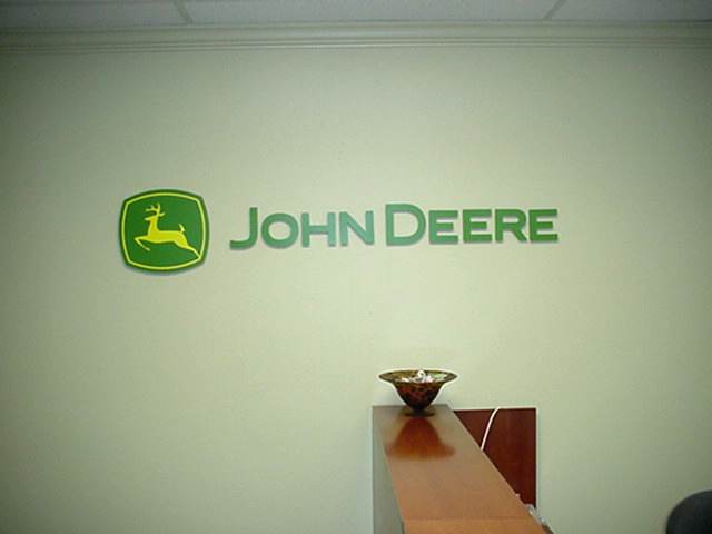 Sign installed Kenner John Deere interior lettering