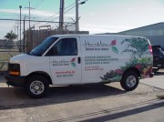 Installation of vehicle wrap for New Orleans based company Heroman Services